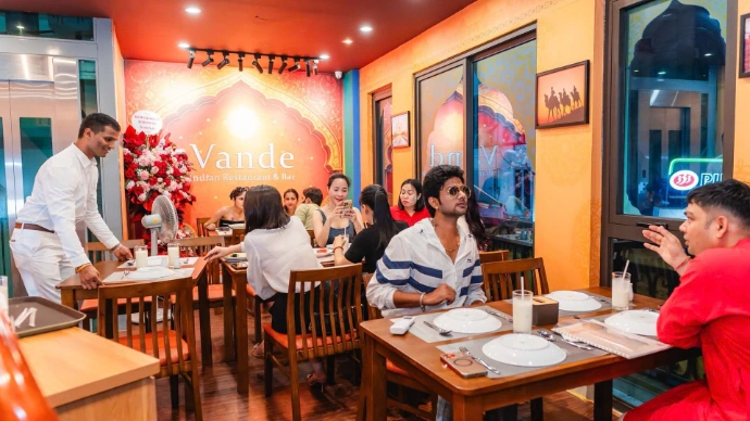 Guests dining at Vande Indian Restaurant and Cafe in Hanoi
