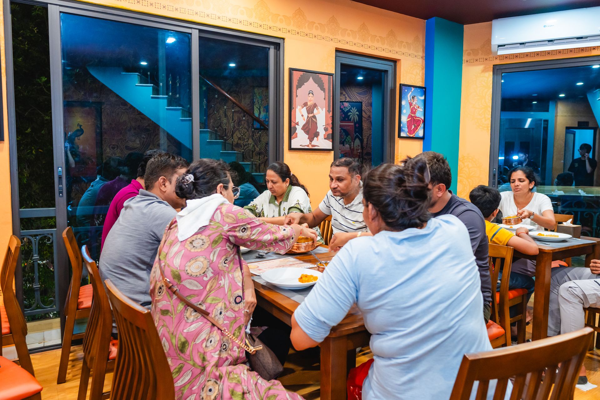 Guests dining at Vande Indian Restaurant and Cafe in Hanoi
